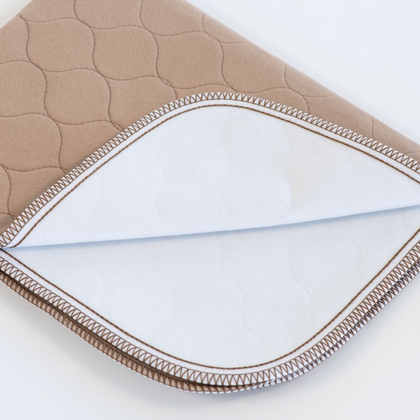 Almohadilla/tapete marrón